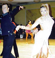 On the floor: Bruce with dance partner Crystal, who was also on the train